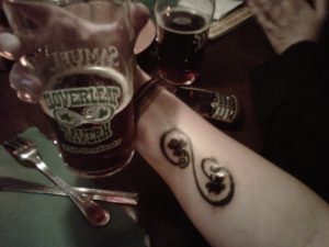 tattoo of pub logo